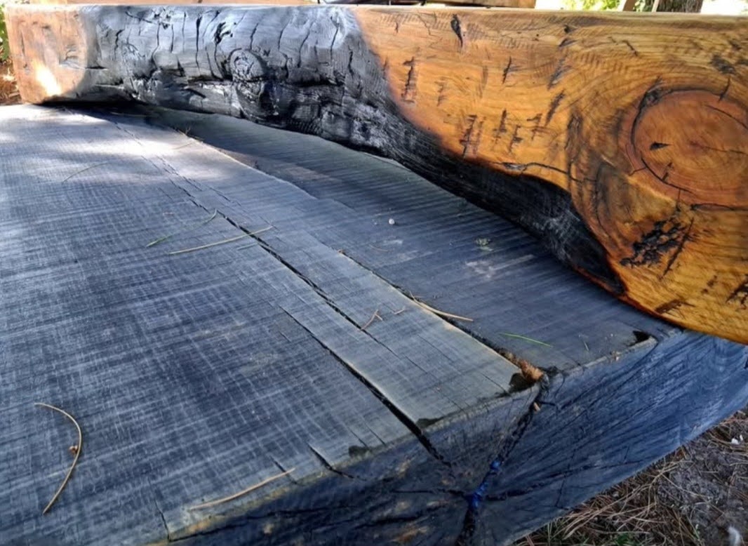Live edge white oak mantel with charred finish